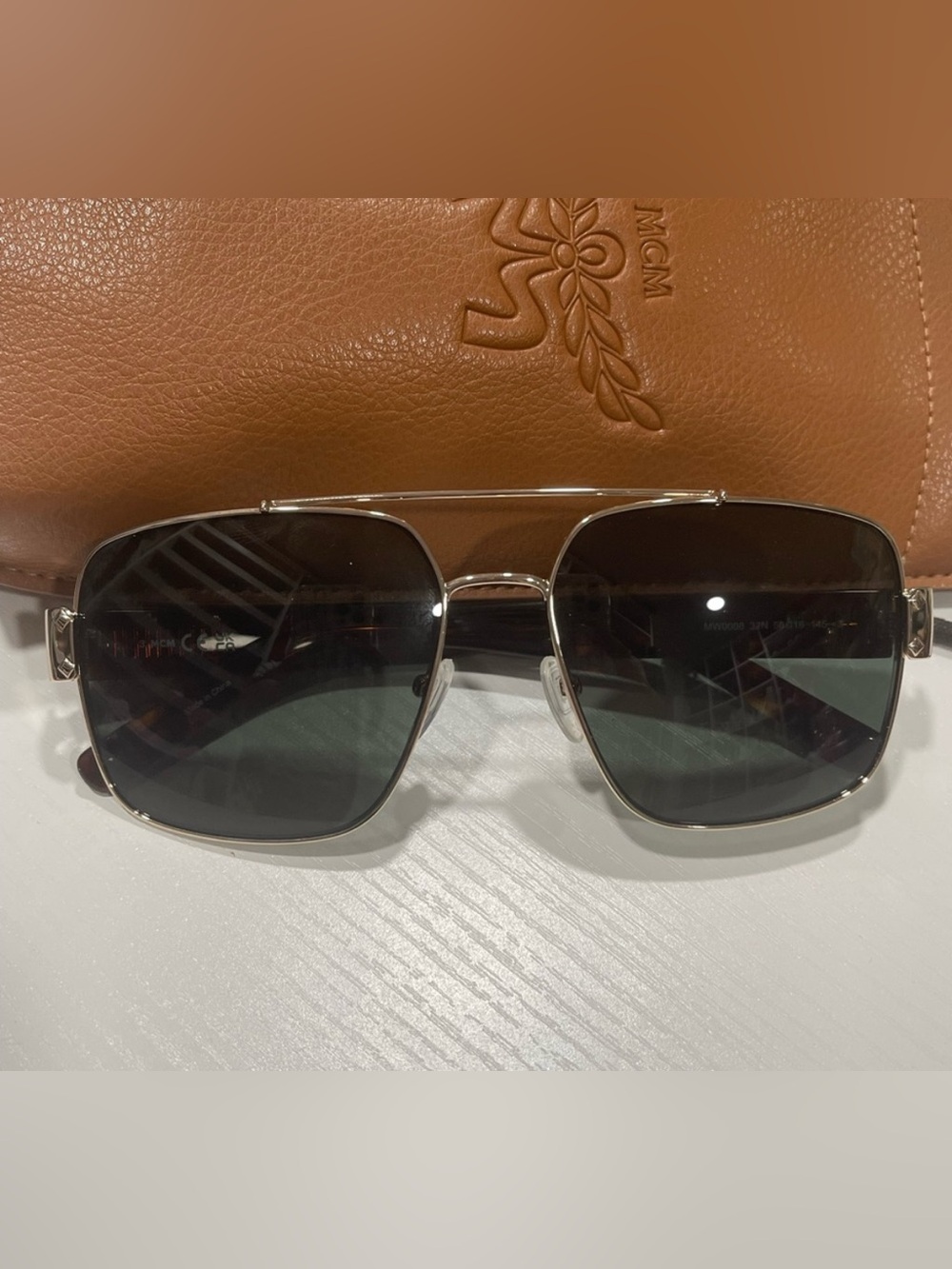 MCM Gold-Frame Aviator Sunglasses with Brown Leather Case